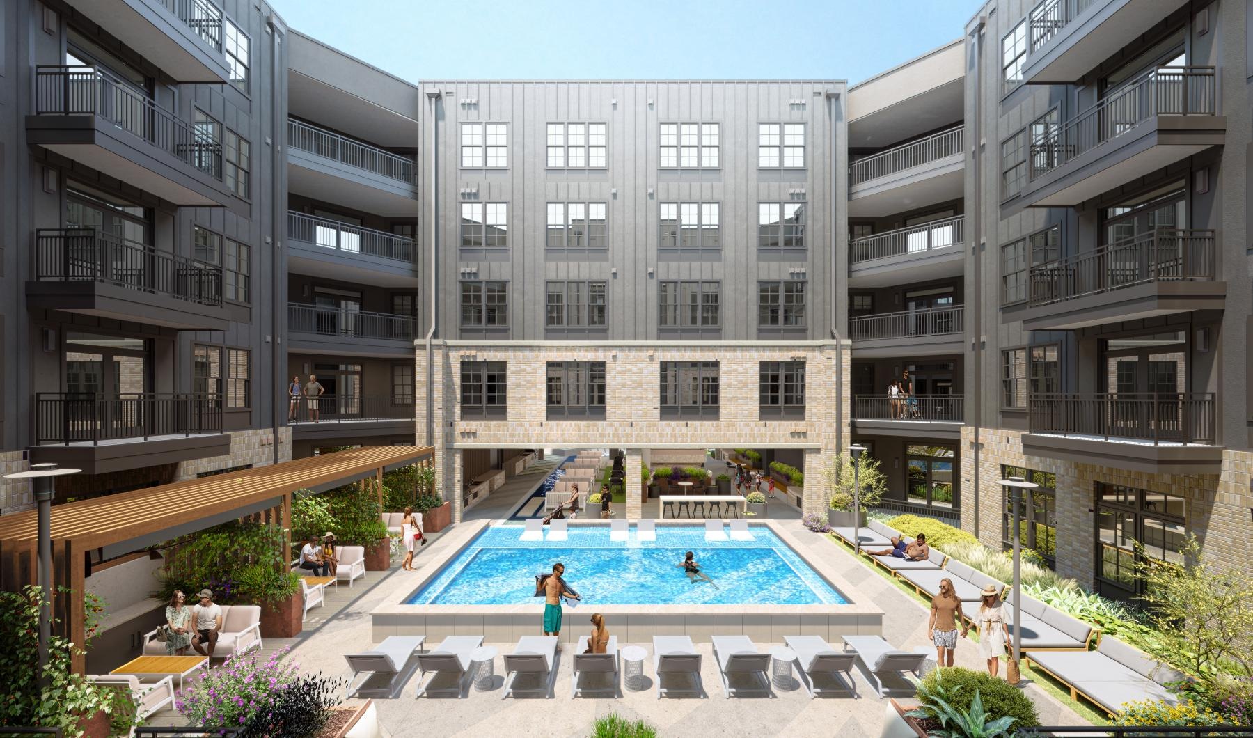a large building with a pool in the front