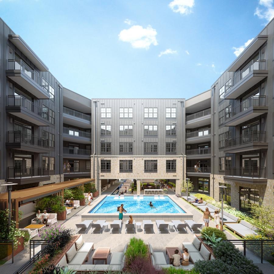 a large building with a pool in the front